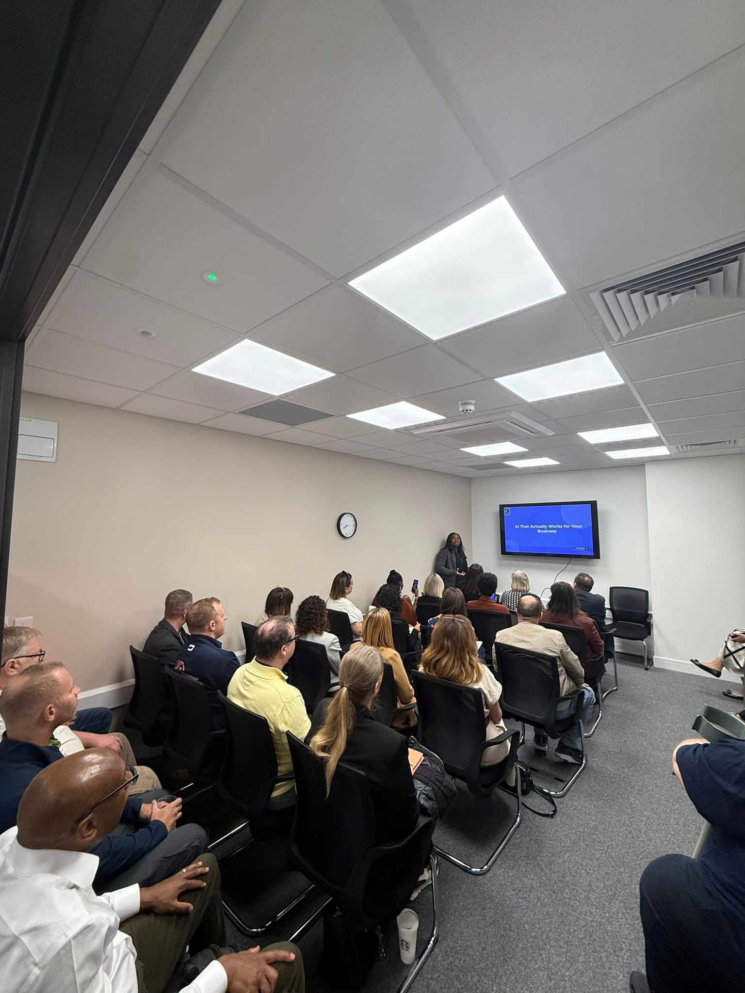 Abi Odedeyi speaking at an AI training event